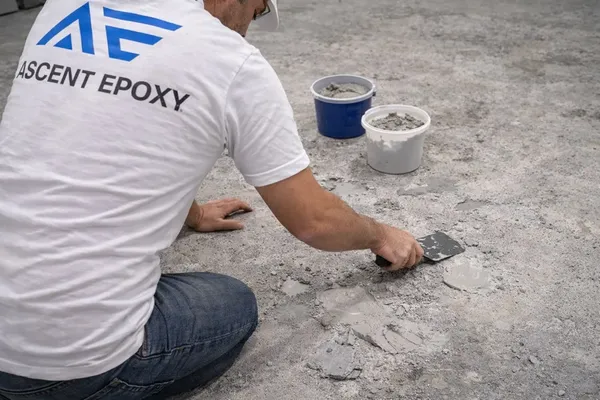 Grinding and preparing concrete after coating removal in Duval County