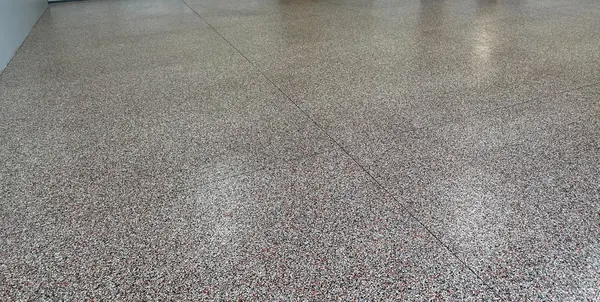 Commercial seamless gray and red flake epoxy floor Duval County